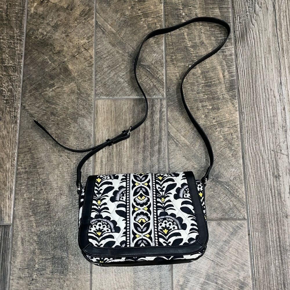 Vera Bradley crossbody black & white floral bag 13”x9”x22” adjustable strap.